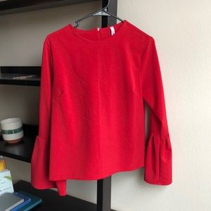 Red bell-sleeve blouse